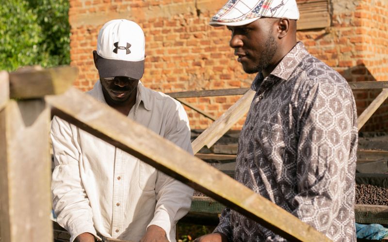 Farmers sorting coffee beans in East Africa